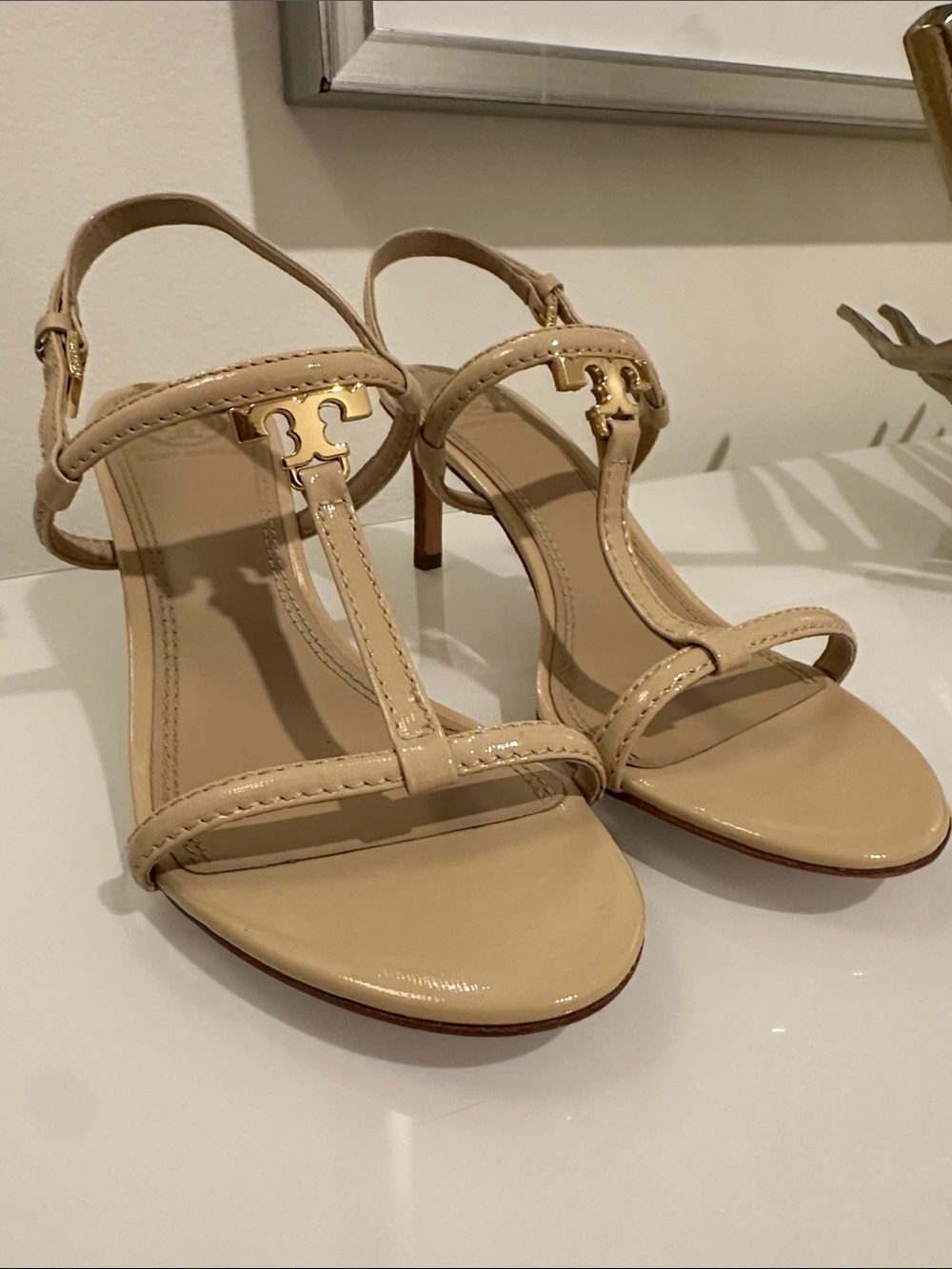 Tory Burch Beige Patent Leather T-Strap Heels with Gold Logo